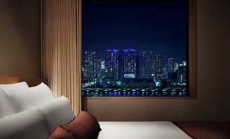 [Upper Floor] Moderate Queen Plus Room - Non-Smoking | In-room safe, blackout drapes, free WiFi, bed sheets