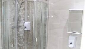 Shower, free toiletries, hair dryer, towels