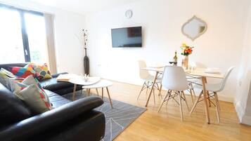 Premier Apartment | Living room | Flat-screen TV