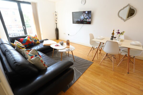 Premier Apartment | Living room | Flat-screen TV