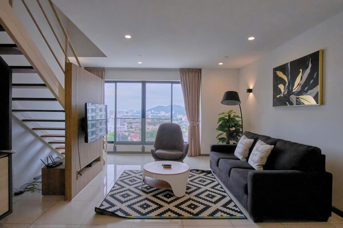 Apartemen Kota, pemandangan kota (SG-16-06) | Ruang keluarga | TV layar datar
