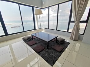 Apartamento conforto (SG15-1 DC) | Área de estar | TV de tela plana