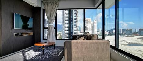 Appartamento Comfort (SG15-1 DC) | Area soggiorno | TV a schermo piatto