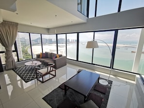 Apartamento conforto (SG15-1 DC) | Área de estar | TV de tela plana
