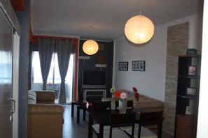 Appartement, vue mer (Happy Home) | Coin séjour