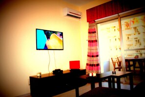 Apartment, Partial Sea View | Living area | Flat-screen TV - Happy Home 3 (Limassol)