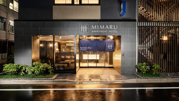 A modern building with a sign for "MIMARU APARTMENT HOTEL". - MIMARU Tokyo Ginza East (Tokyo)
