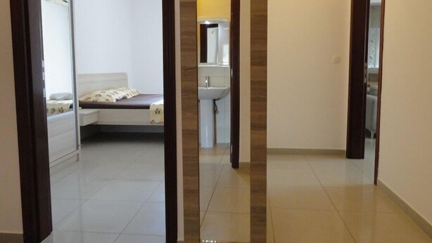 Deluxe Apartment, Sea View | Living area | Flat-screen TV - Lux Apartments Natasa (Budva)