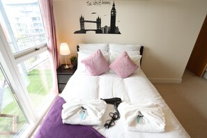 Appartement, plusieurs lits, vue jardin | 2 chambres, décoration personnalisée, ameublement personnalisé