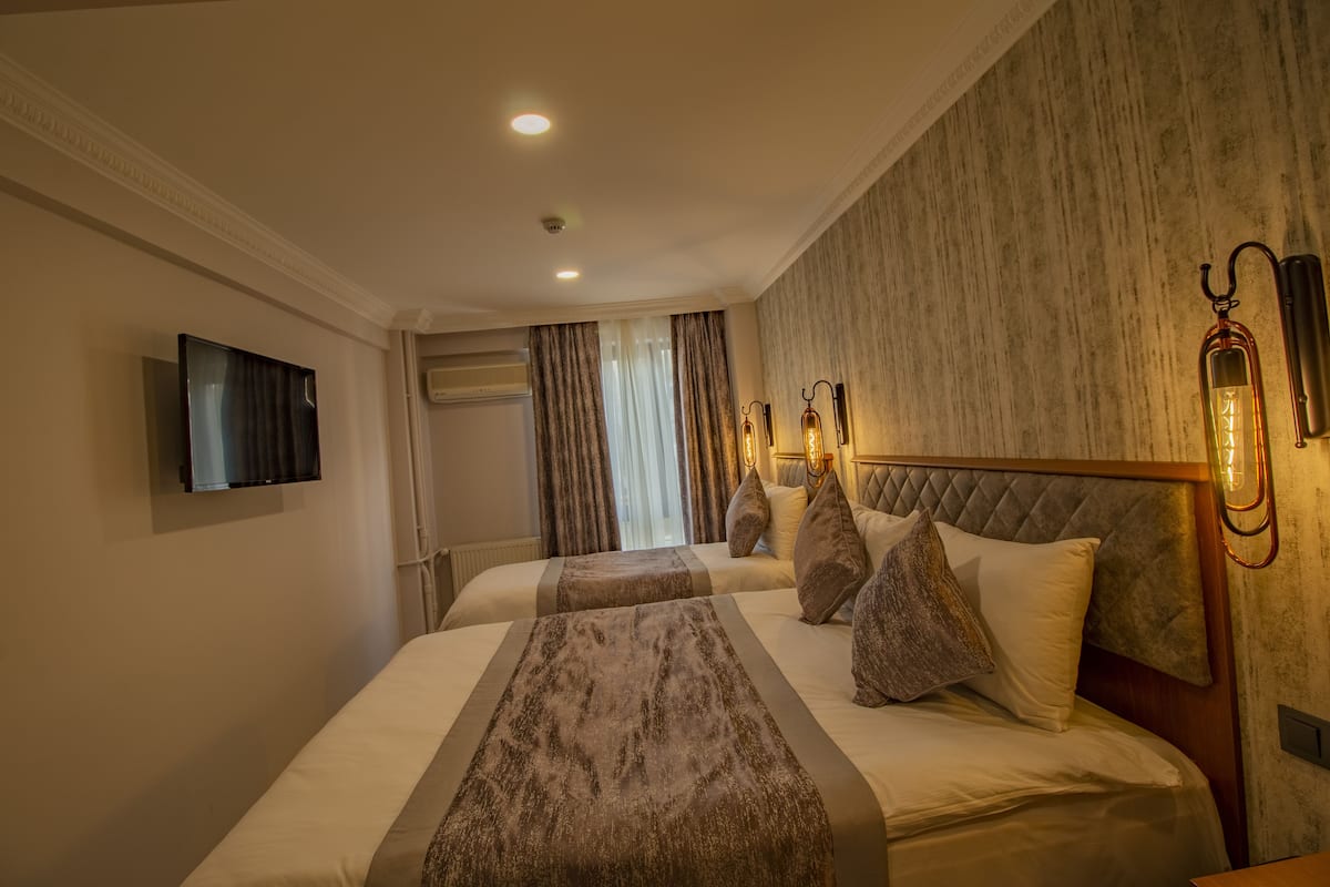 Triple Room | 1 bedroom, minibar, soundproofing, iron/ironing board (on request)