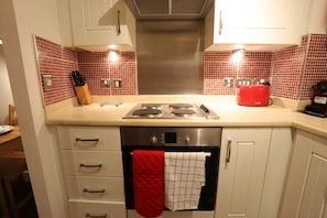 Appartement « Premier », plusieurs lits, vue ville | Cuisine privée