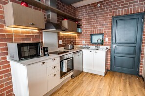 Standard Two Bedroom Apartment | Private kitchen | Full-sized fridge, microwave, oven, stovetop