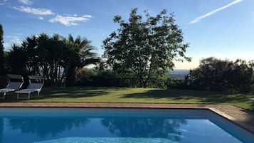 Outdoor pool, open 9:30 AM to 7:00 PM, pool umbrellas, sun loungers