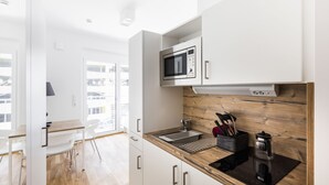Classic Apartment | Private kitchenette | Espresso maker, fridge, microwave, stovetop - Myroom Service Apartments (Munich)