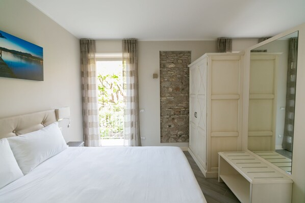 Superior Apartment, 1 Bedroom | Down comforters, in-room safe, desk, blackout drapes