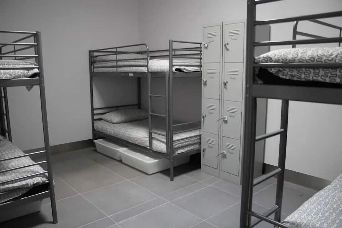 Bed in 6 Bed Mixed Dormitory Room | 1 bedroom, in-room safe, soundproofing, iron/ironing board