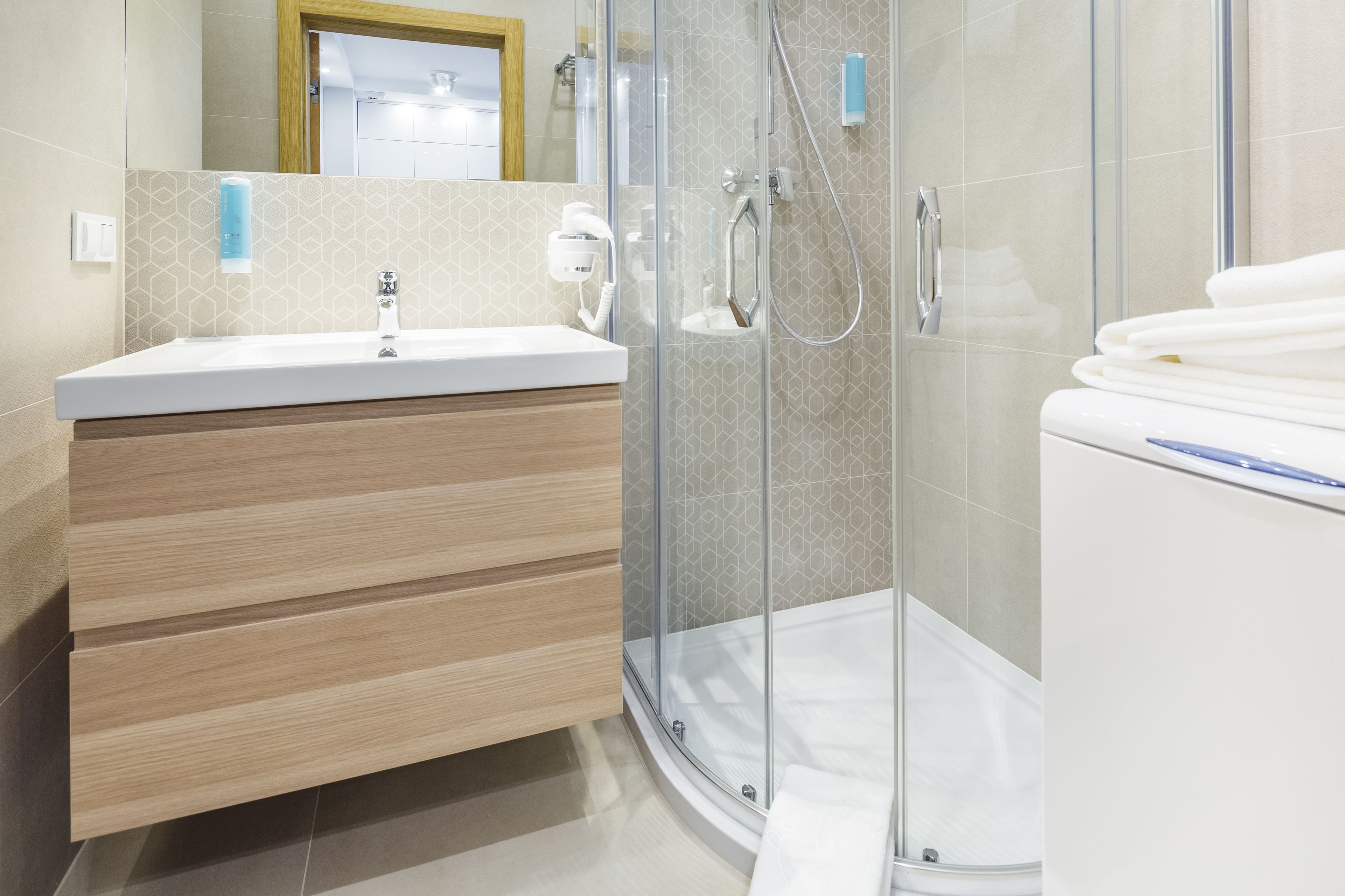 deluxe apartment, balcony | bathroom | shower, designer toiletries, hair dryer, towels