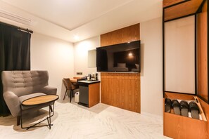 Suite | Sala d'estar | Televisor de pantalla plana, ordinador i pel·lícules de pagament 