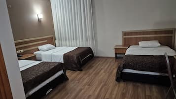 Desk, laptop workspace, free WiFi, bed sheets