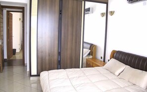 Apartament, 3 dormitoris | 3 dormitoris, roba de llit d'alta qualitat i cortines opaques
