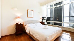 Apartment, 2 Queen Beds | 2 bedrooms, blackout drapes, iron/ironing board, cribs (free)