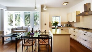 Apartment, 2 Queen Beds | Private kitchen | Espresso maker, full-size fridge, microwave, oven