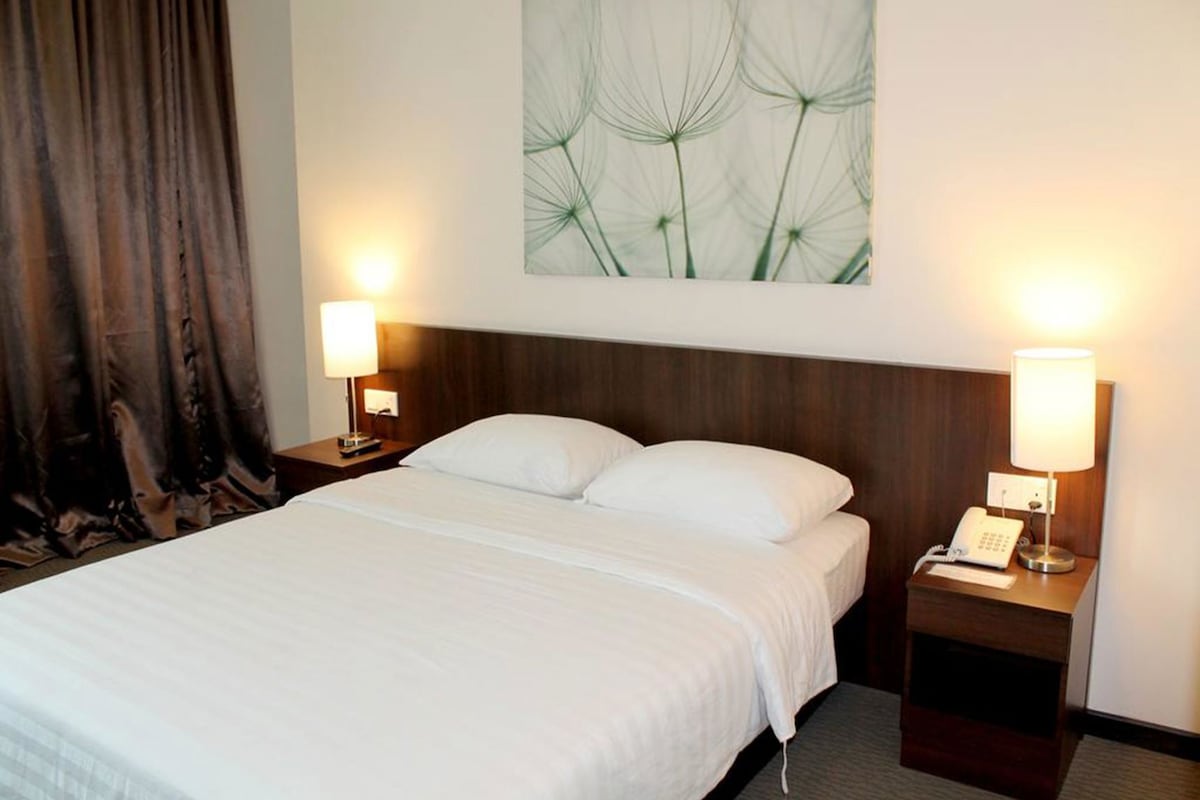 Desk, blackout drapes, rollaway beds (surcharge), WiFi (free)