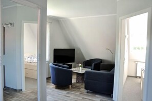 Căn hộ Tiêu chuẩn | Khu phòng khách | TV màn hình phẳng 