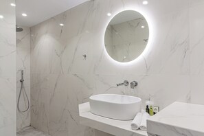One Bedroom Apartment with Outdoor Hot Tub Sea and Sunset View | Bathroom | Shower, rainfall showerhead, hair dryer, bidet - Aroma Cavas (Santorini)