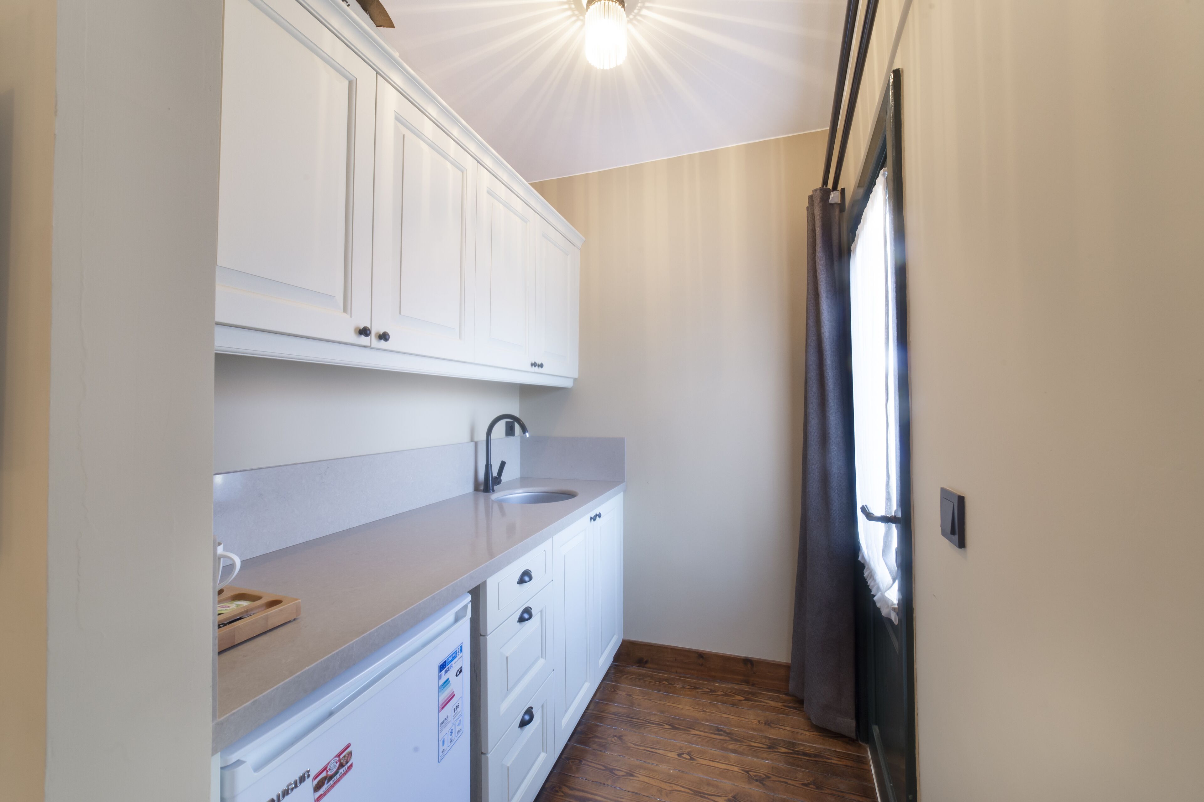 premier suite, kitchenette | private kitchenette | fridge, electric kettle