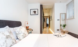 Apartemen, 2 kamar tidur | 2 kamar tidur, setrika/meja setrika, Wi-Fi gratis, dan seprai linen