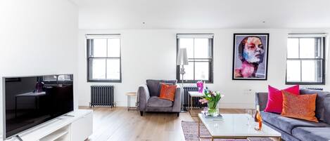 Penthouse, 3 Bedrooms | Living area | Flat-screen TV