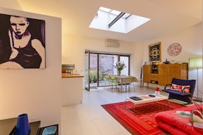Departamento, 1 habitación | Área de sala de estar | Televisión