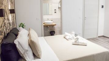 Camera, bagno privato (Mappamondo) | 1 camera, minibar (con alcuni snack e alcune bevande gratis)