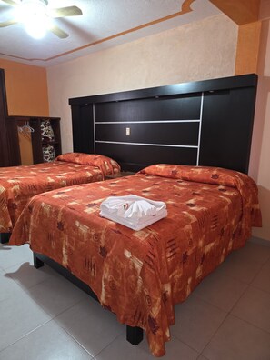 Quadruple Room, 2 Double Beds | Iron/ironing board, free WiFi - Hotel Villa De Las Flores (Zacatlán)