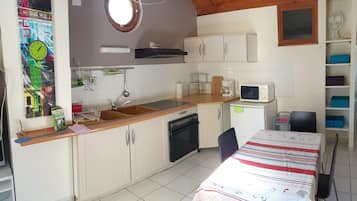 Apartment | Private kitchen | Fridge, microwave, stovetop, coffee/tea maker