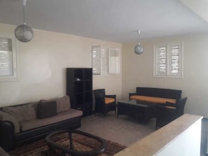 Apartment, 2 Bedrooms | Living area - Paloma Pied Sur Sable (Aïn Harrouda)