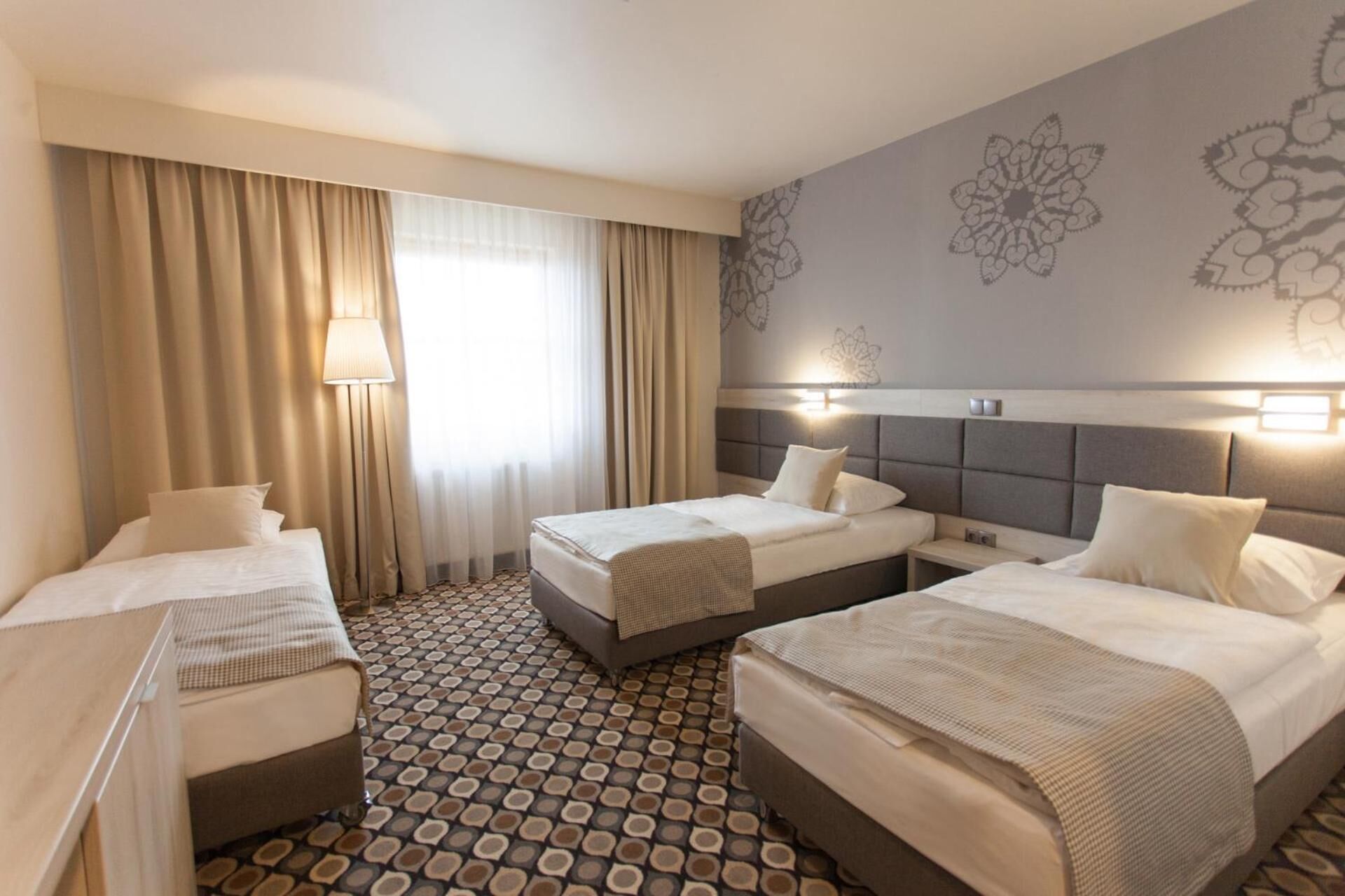 Memory foam beds, desk, laptop workspace, blackout drapes