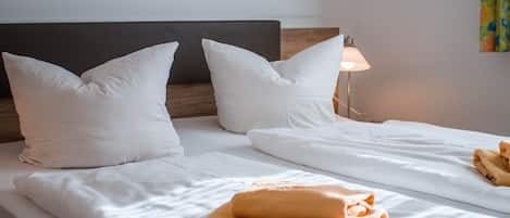 Premium bedding, down duvets, desk, bed sheets