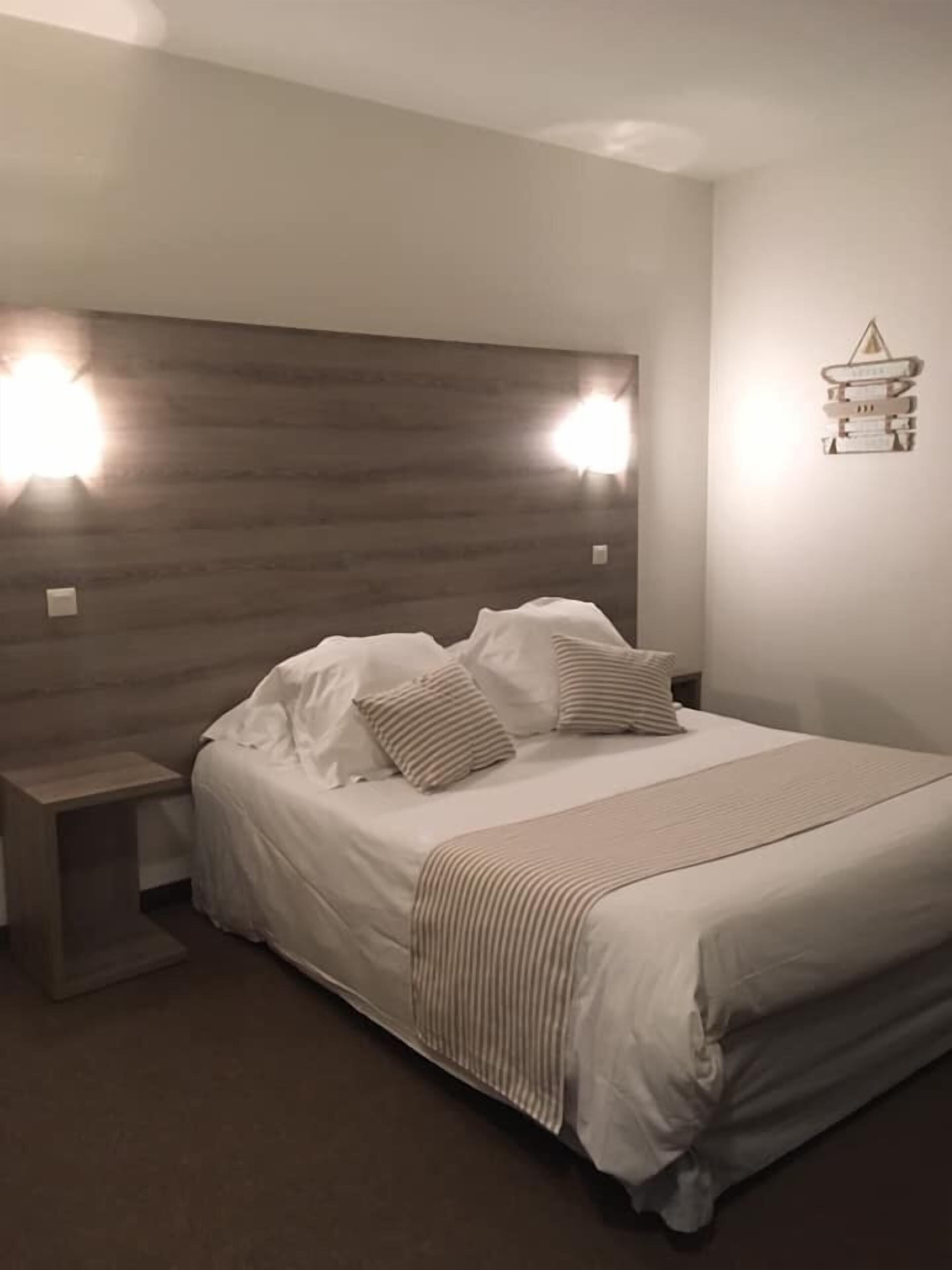 Blackout curtains, iron/ironing board, free WiFi, bed sheets