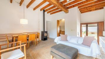 Apartment, 2 Bedrooms, Garden View | Living area | 35-inch LED TV with digital channels, TV, fireplace