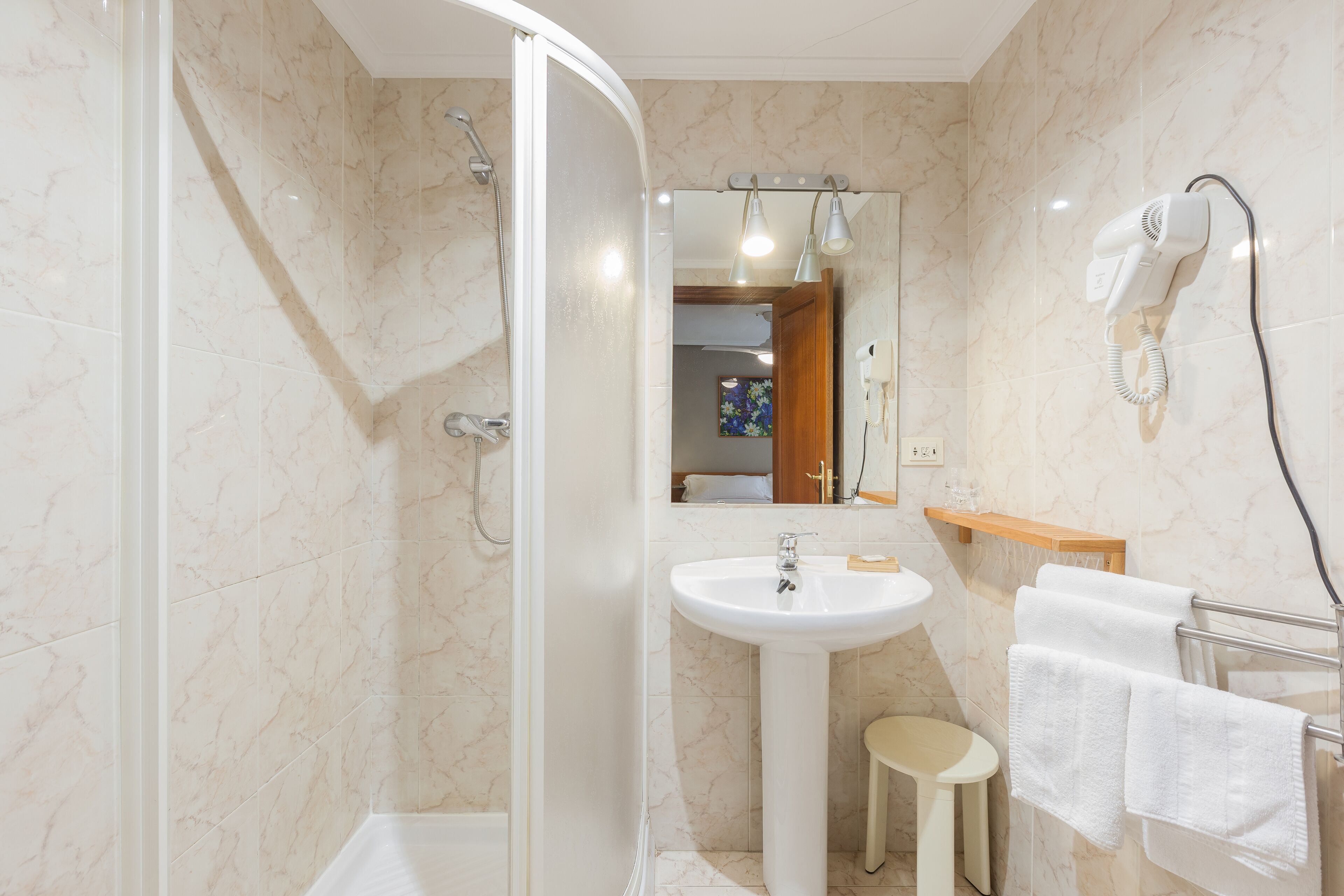 shower, free toiletries, hair dryer, towels