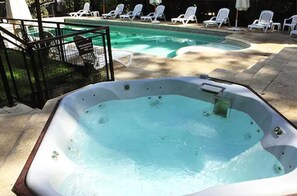 Indoor pool, outdoor pool, pool umbrellas, pool loungers