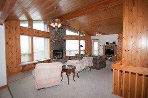 Flat-screen TV, fireplace, DVD player, foosball
