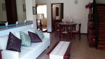 Deluxe Villa, Garden View | Living room | LED TV