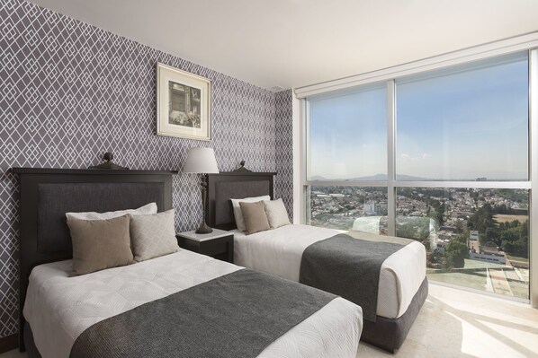 2 عدّة غرف نوم وواي فاي مجانًا وملاءات أسرّة