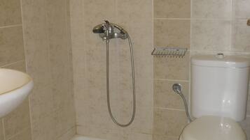 Standard Triple Room, City View | Bathroom | Shower, hair dryer, towels, shampoo