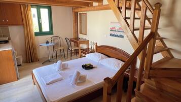 Standard Quadruple Room, City View | In-room safe, blackout drapes, iron/ironing board, free WiFi