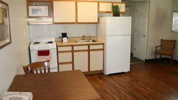 Full-sized fridge, stovetop