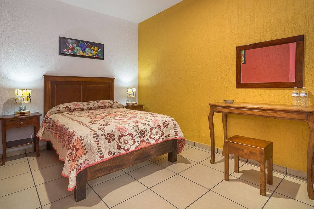 Habitación individual Deluxe | Caja de seguridad en la habitación, wifi gratis y ropa de cama